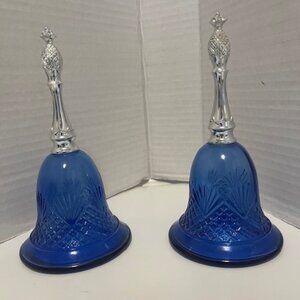 Pair of vintage Avon perfume bottles.